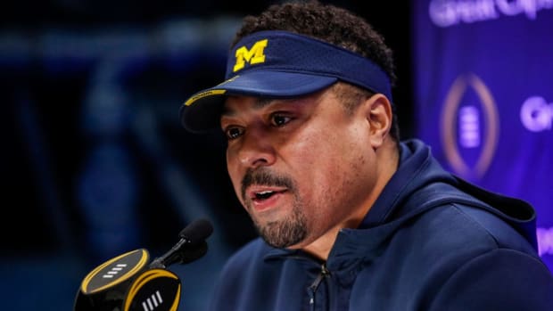 Michigan assistant coach Mike Hart speaks at a press conference on Jan. 6, 2024.